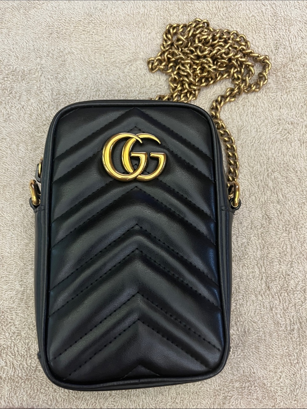 Black Quilted Crossbody Phone Bag with Gold Hardware